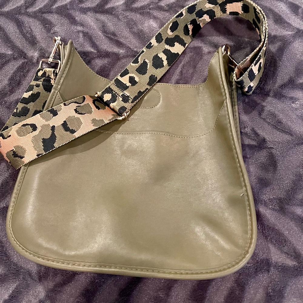 Vegan “leather” purse with in trend army green leopard print strap.